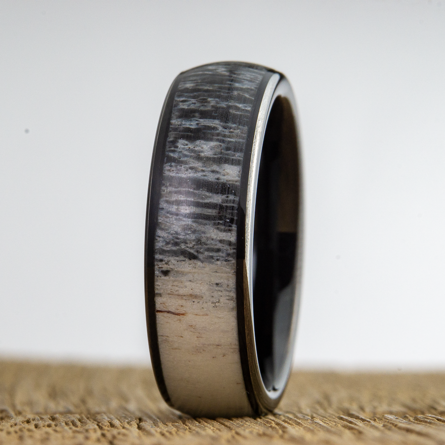 black tungsten wedding ring with deer antler