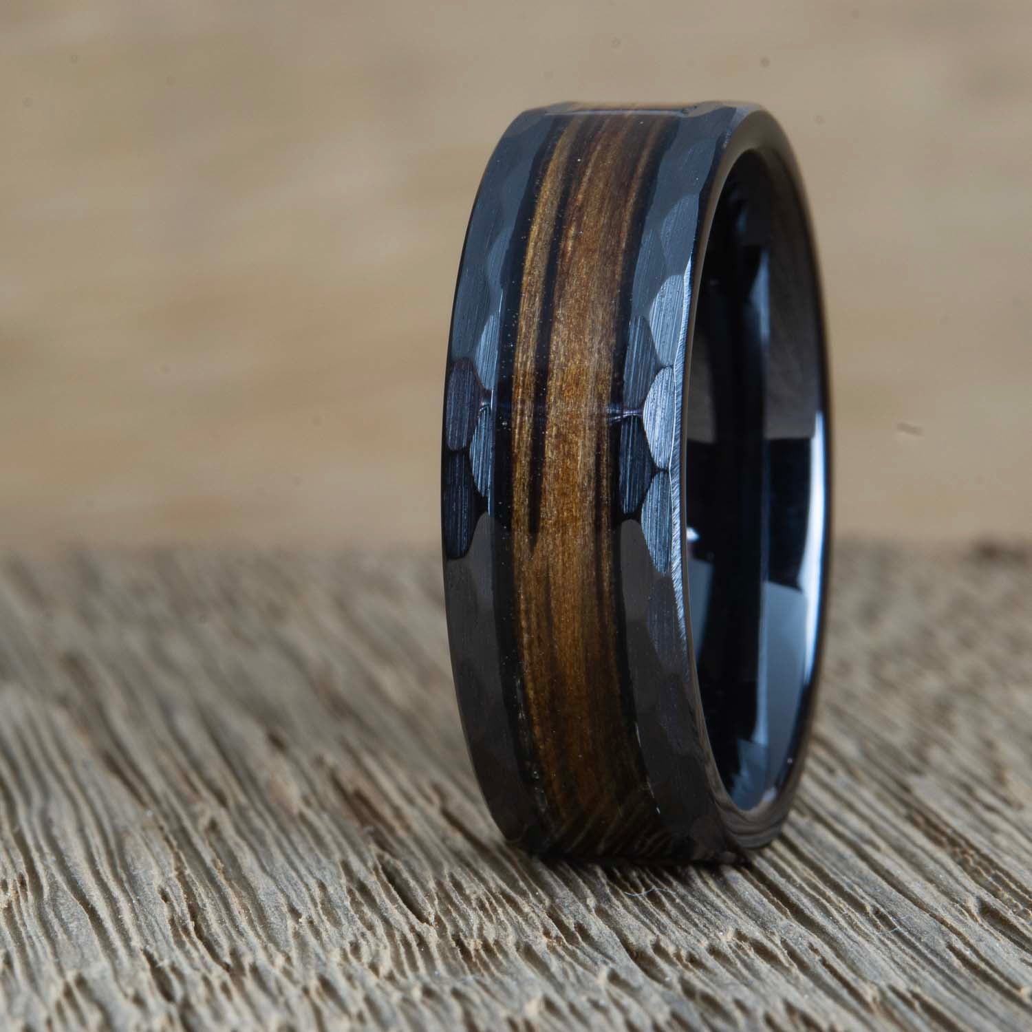 Hammered finish black wedding band with whiskey barrel wood