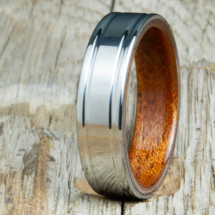 double groove polished titanium Acacia wood ring. Custom unique titanium wood rings made by Peacefield Titanium