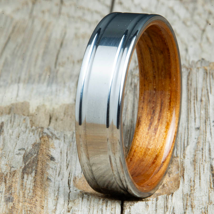 double groove polished titanium Koa wood ring. Custom unique titanium wood rings made by Peacefield Titanium
