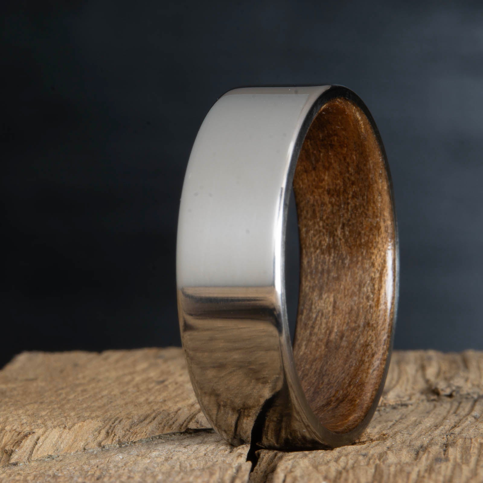 polished titanium English walnut ring