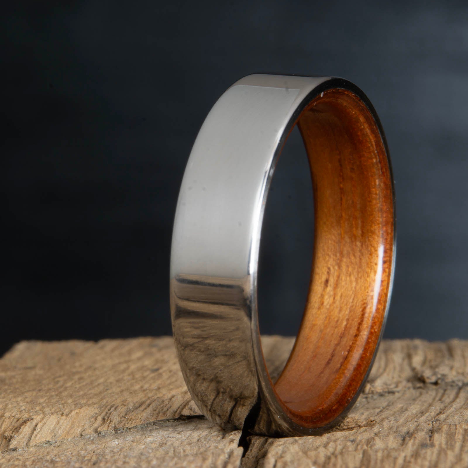 polished titanium with koa wood interior