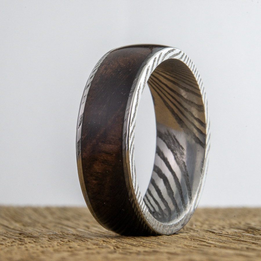 Stainless damascus ring with walnut wood