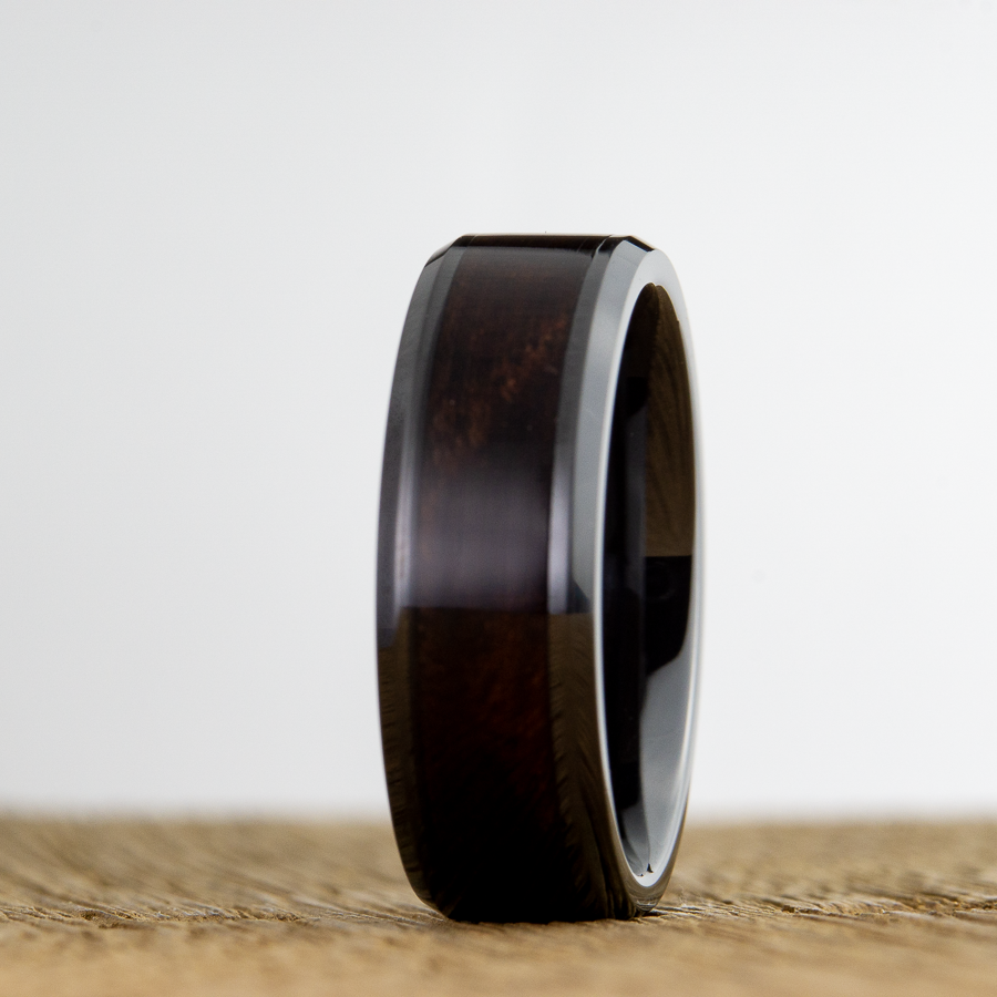 black ring with walnut wood inlay
