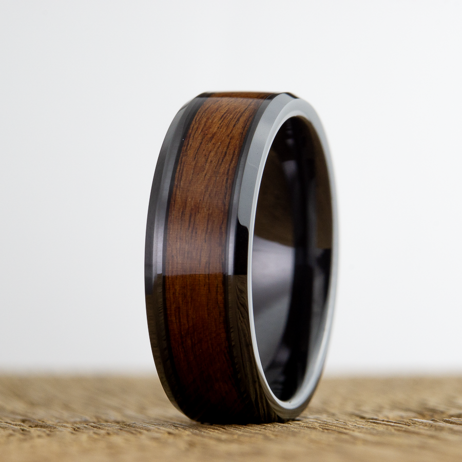 wooden ring with black ceramic band