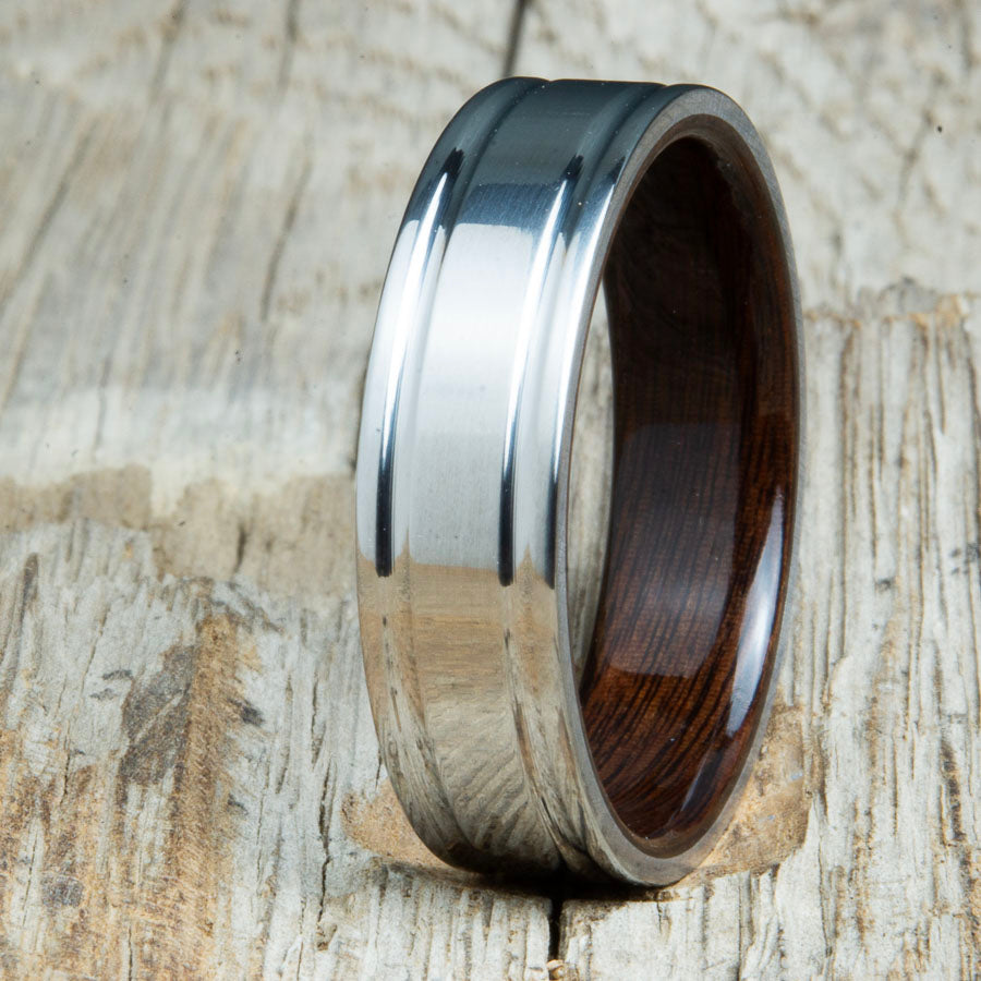 Rosewood bentwood ring with polished double groove 6mm titanium. Custom bentwood wedding bands made by Peacefield Titanium