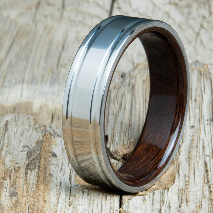 Rosewood bentwood ring with polished double groove 6mm titanium. Custom bentwood wedding bands made by Peacefield Titanium