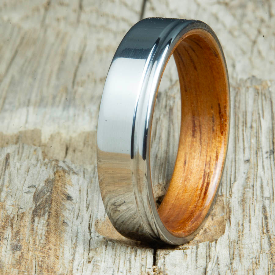 Bentwood Koa wood with polished titanium w/offset groove. unique wedding bands with bentwood interior by Peacefield Titanium