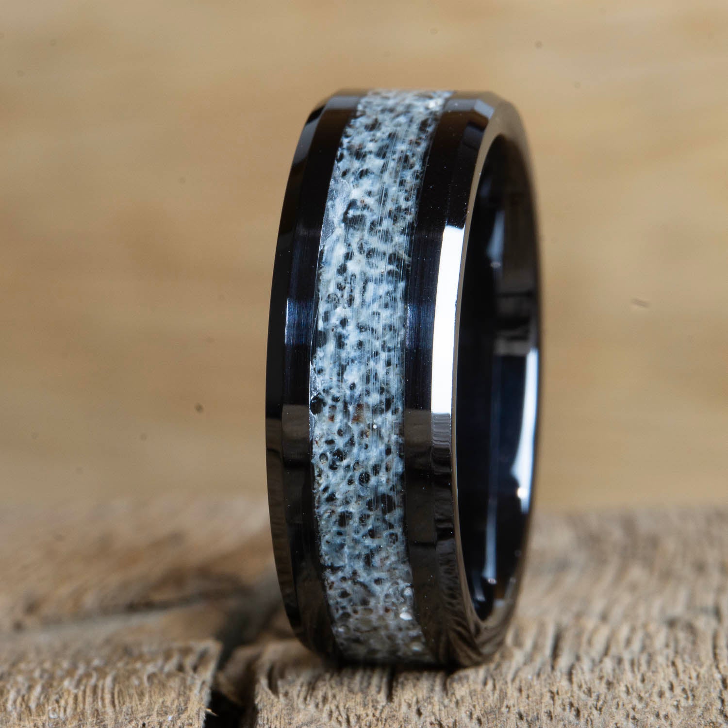 Beveled edge black ring with Antler