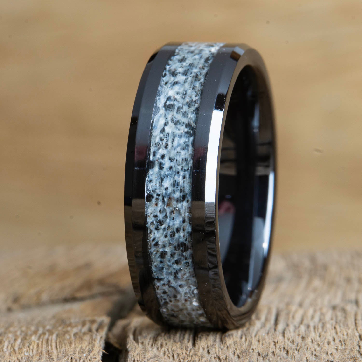 Beveled edge black ring with Antler
