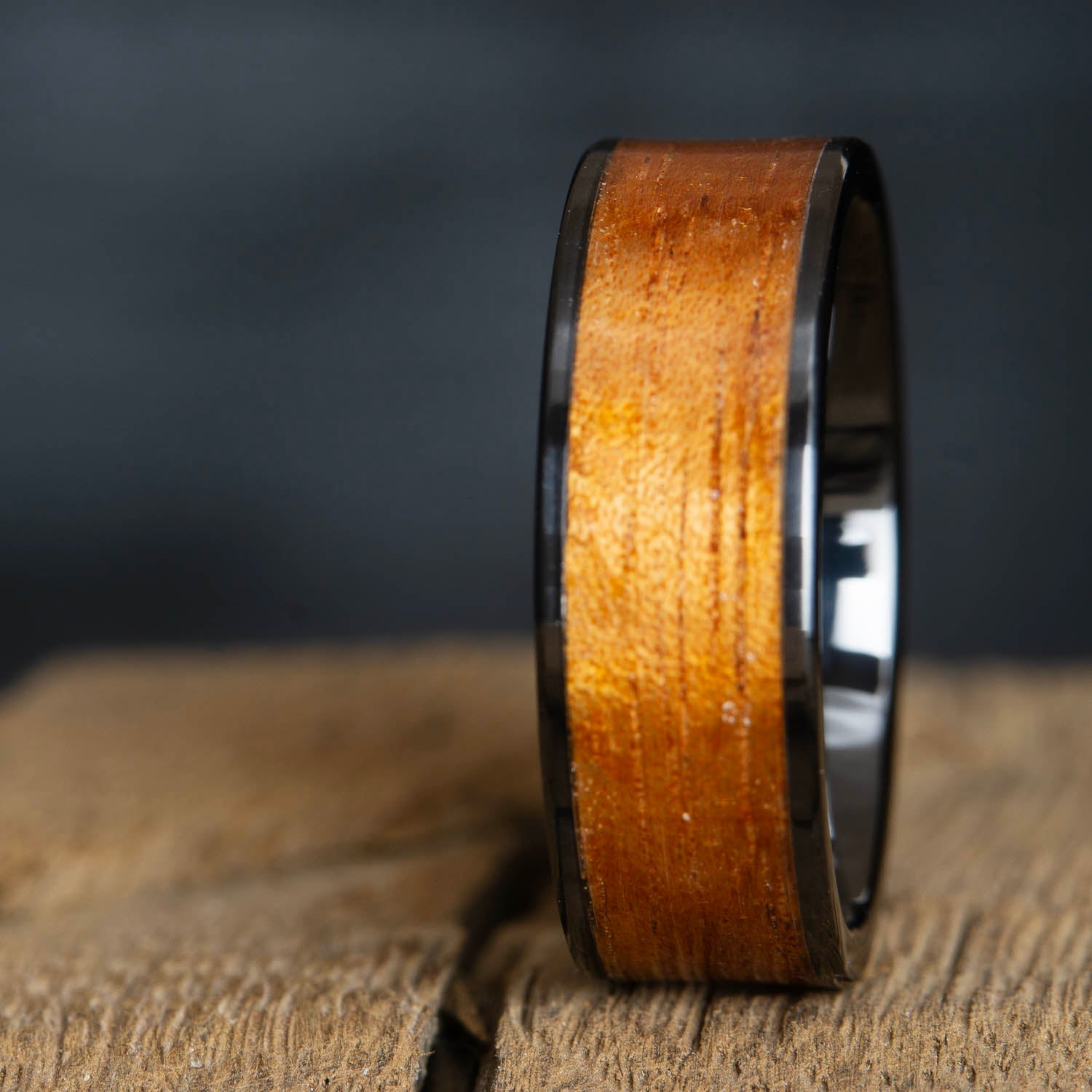Black ring with Koa wood inlay
