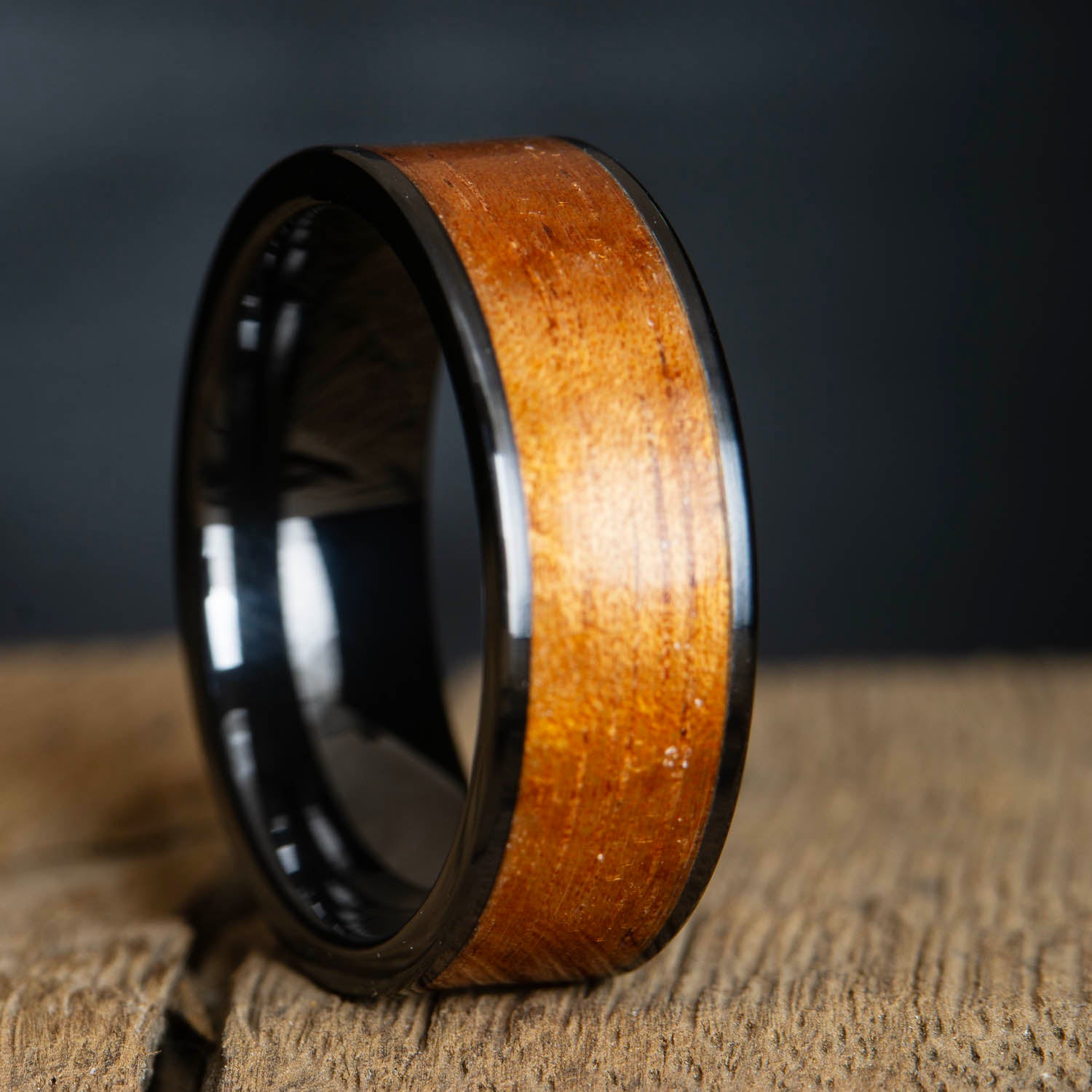 Black ring with Koa wood inlay