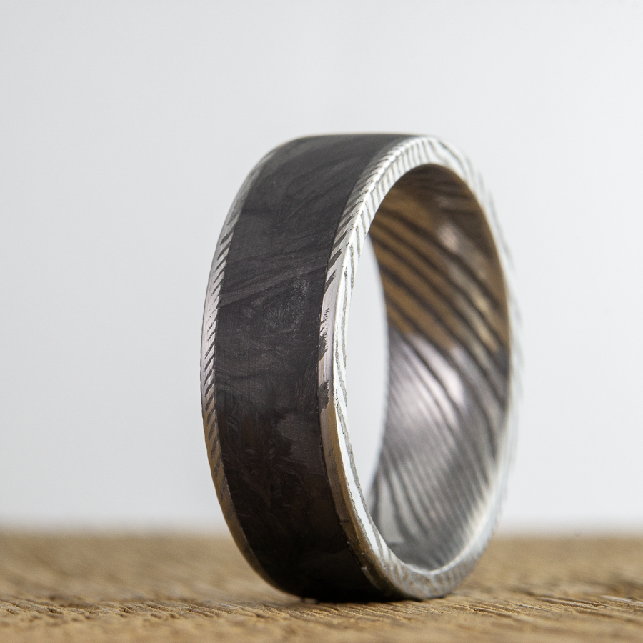 The Forged- Damascus and forged carbon fiber