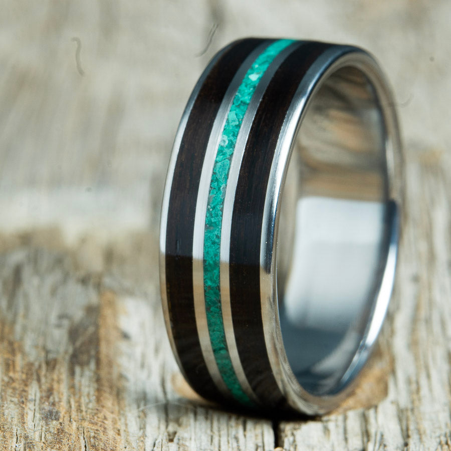 Ebony wooden ring with malachite stone on polished titanium ring by Peacefield Titanium