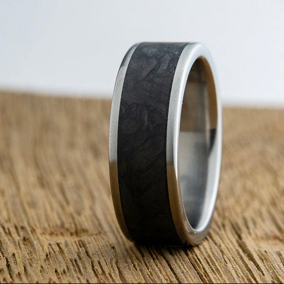 black forged carbon fiber inlay on titanium ring