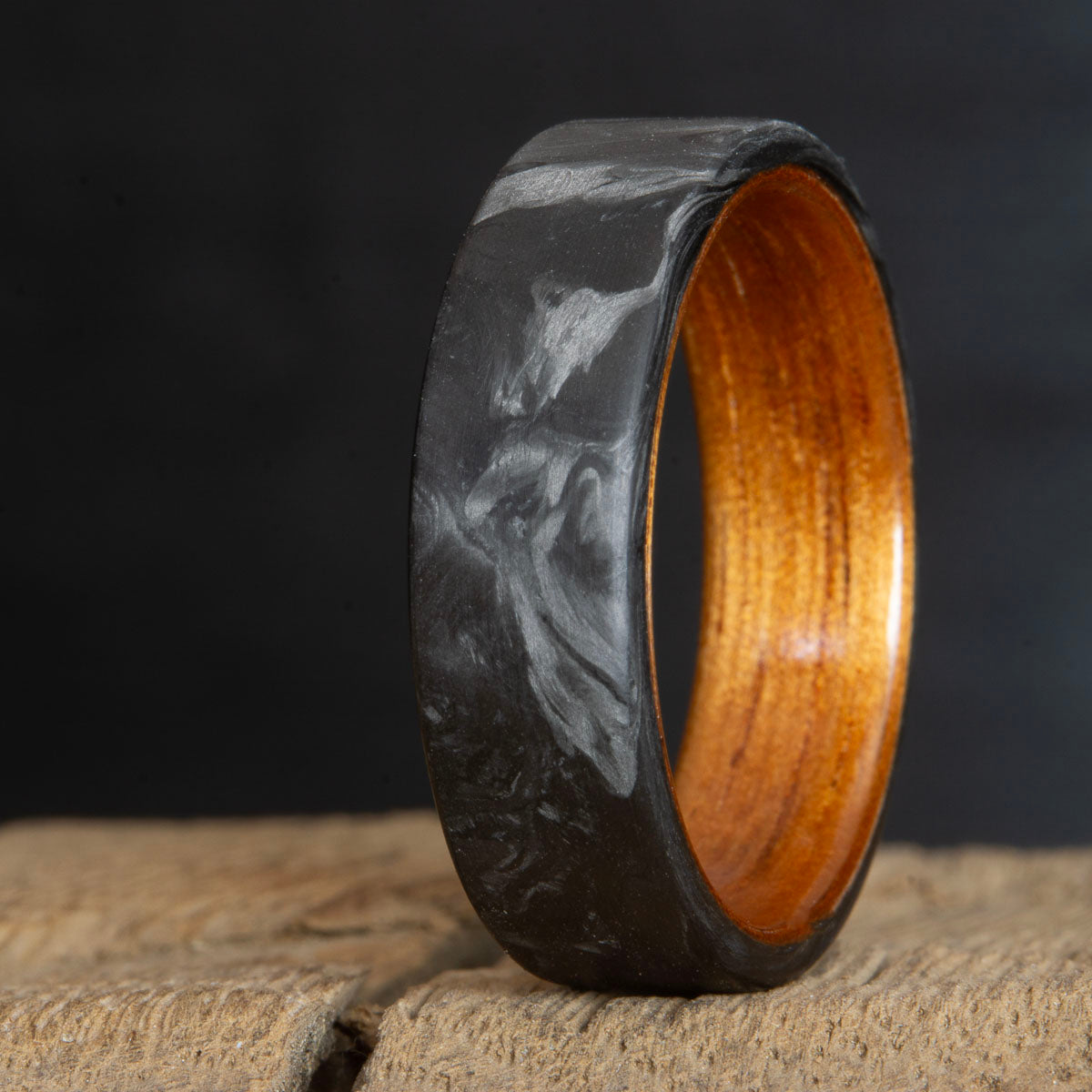 Forged carbon fiber black ring with koa wood insert