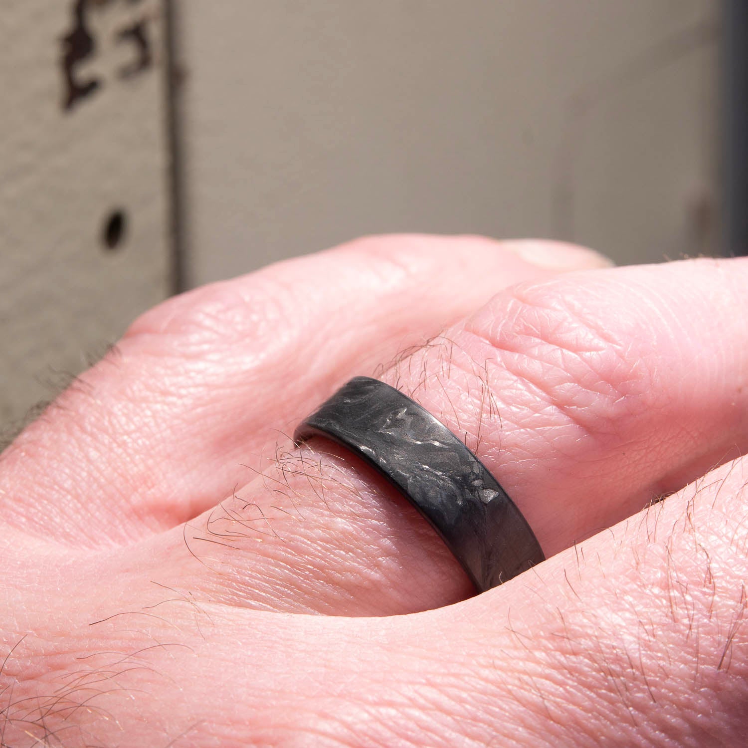 Forged carbon fiber ring with whiskey barrel wood