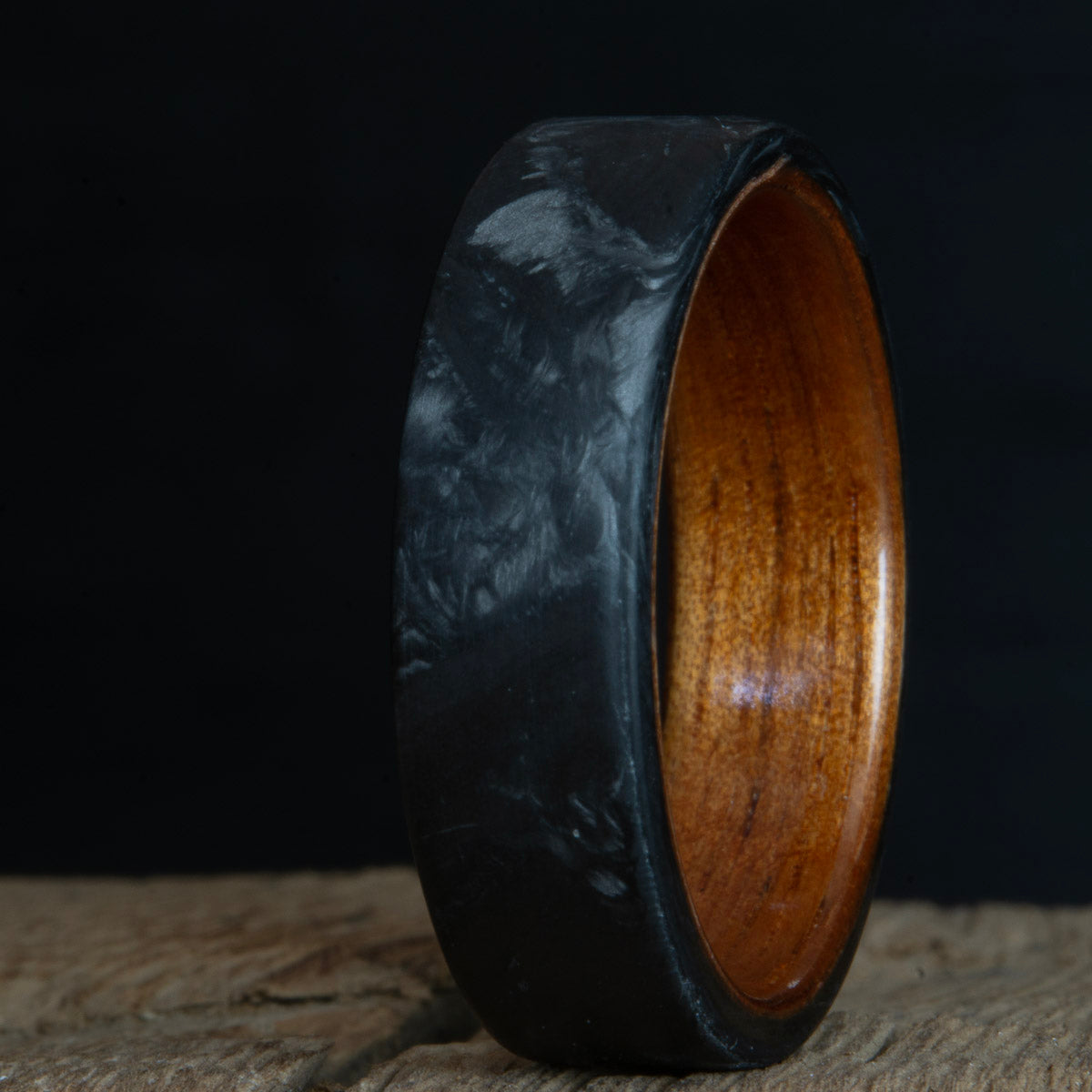 Forged carbon fiber ring with Koa wood insert