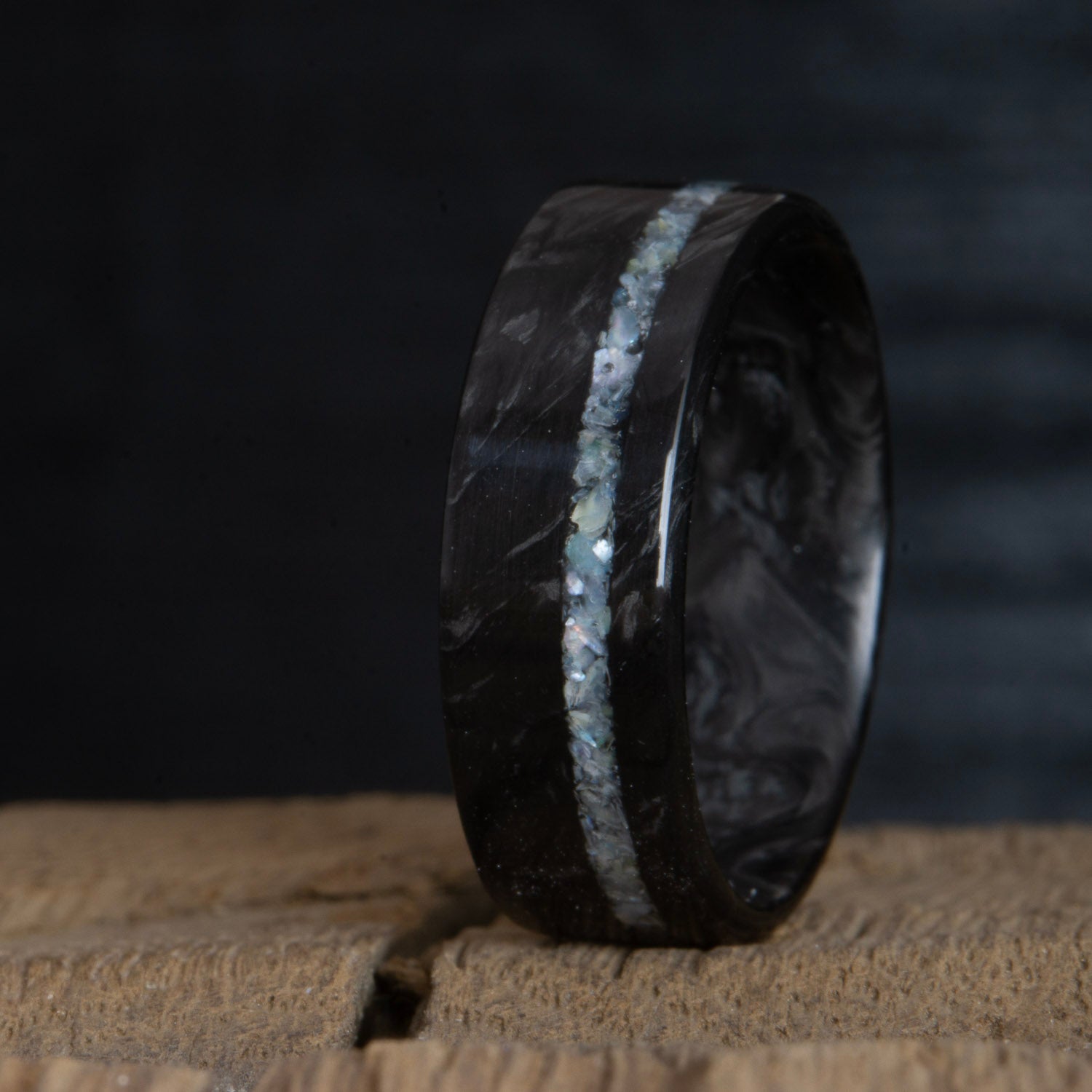 Forged carbon fiber ring with mother of pearl