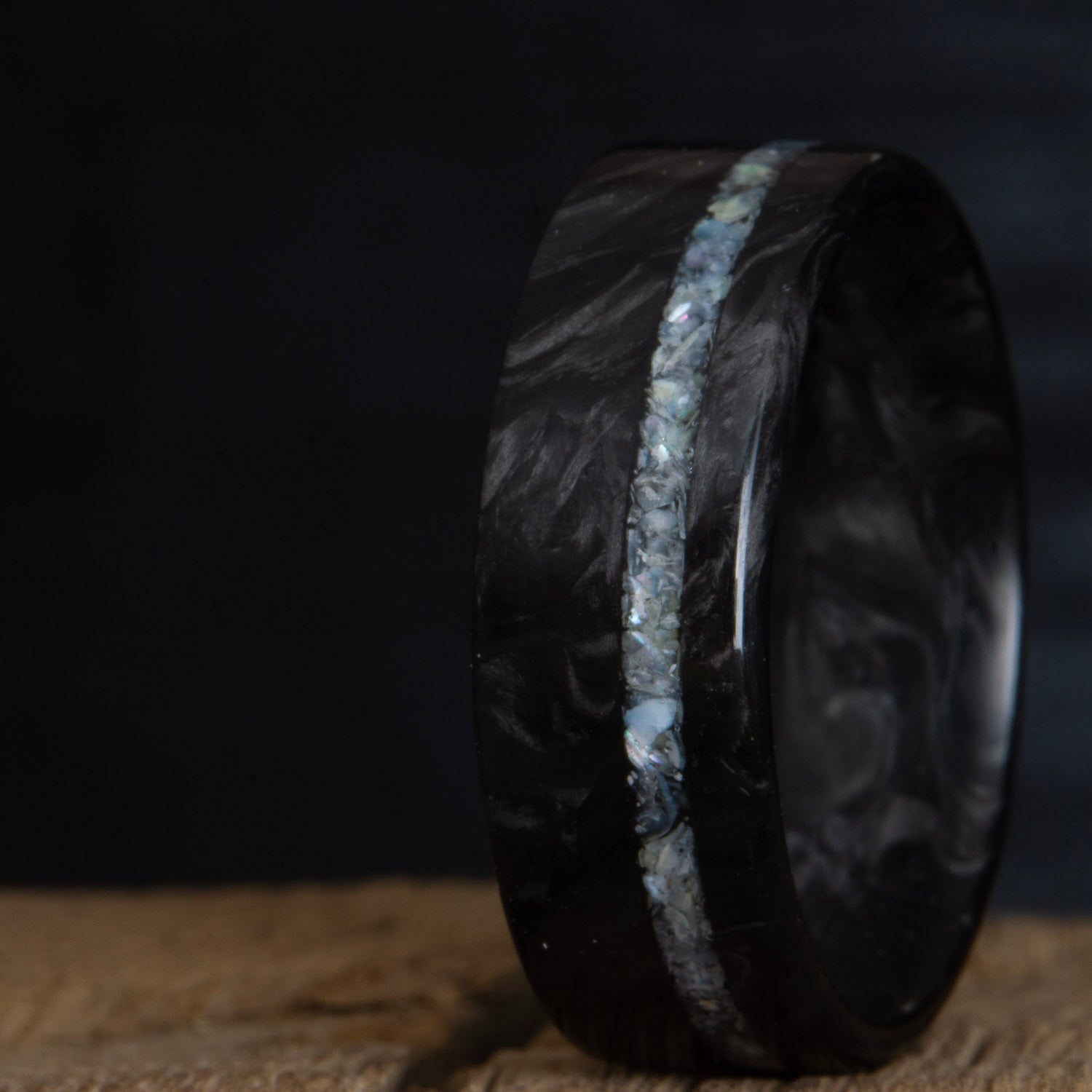 Forged carbon fiber ring with mother of pearl