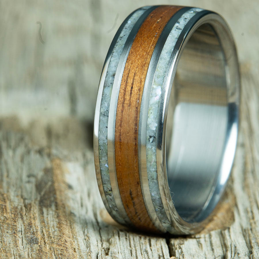 Koa wood ring with mother of pearl inlays
