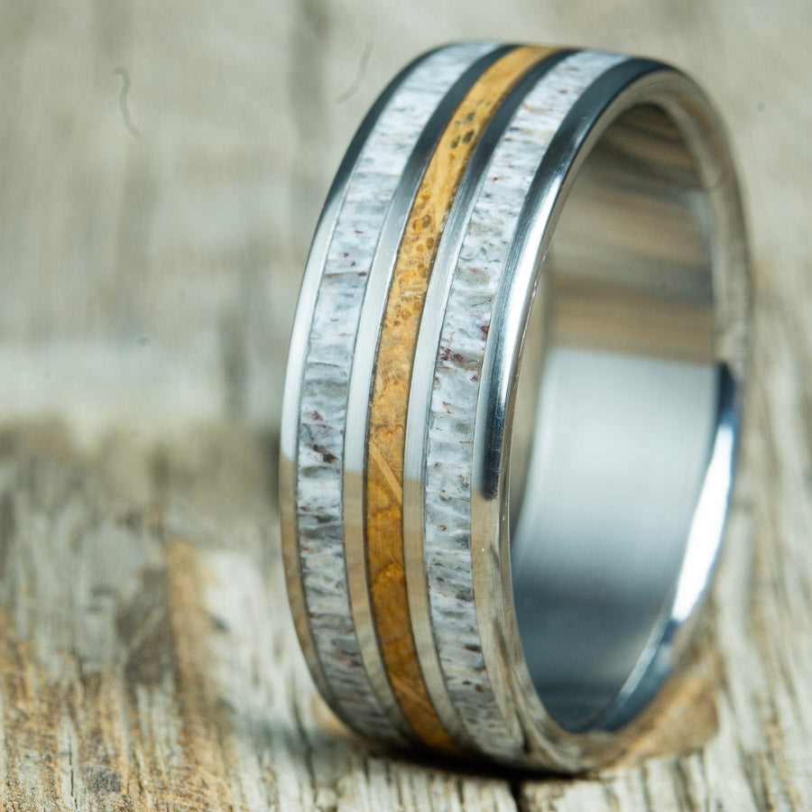 Whiskey barrel and Antler wedding band made by  Peacefield Titanium
