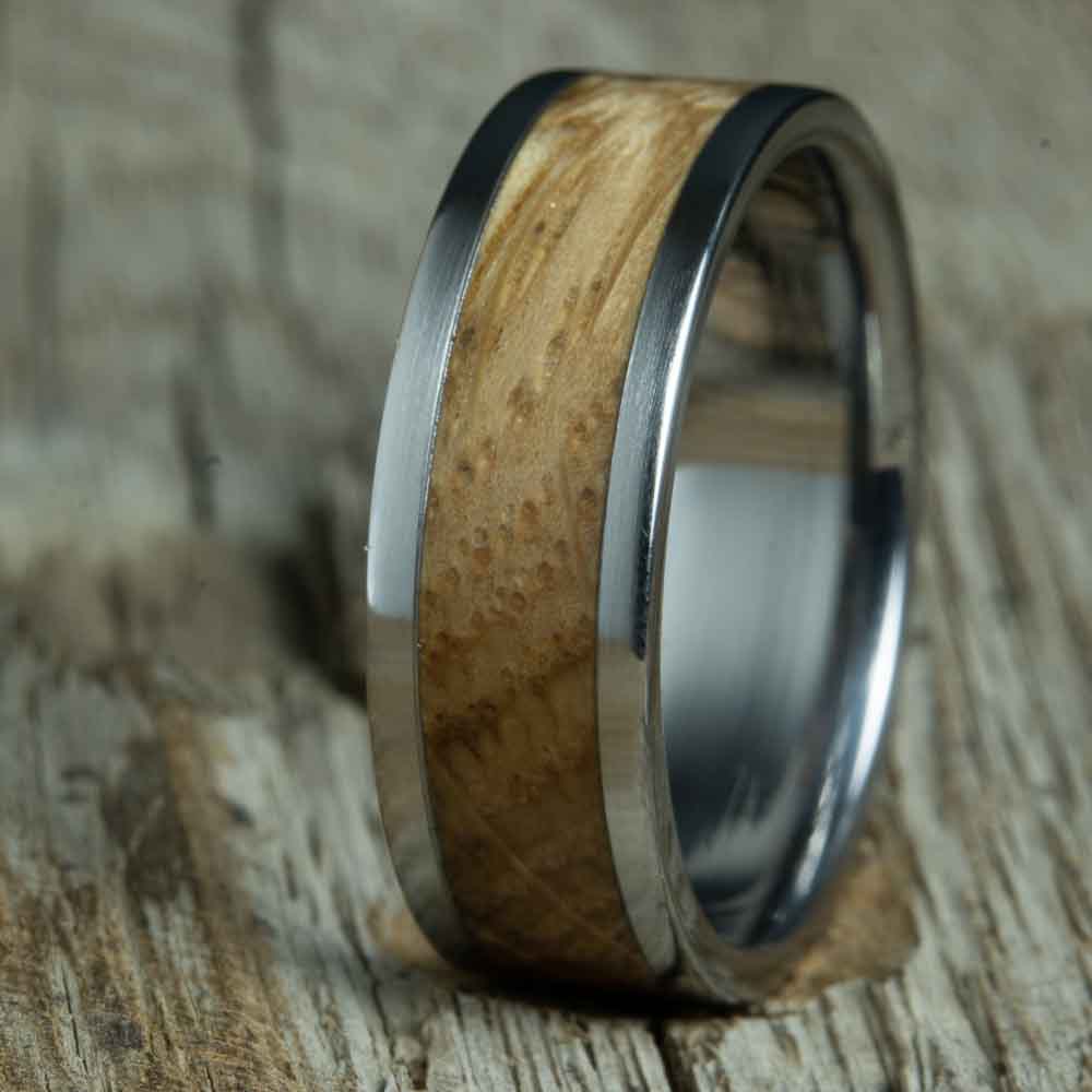 titanium ring with whiskey barrel wood inlay