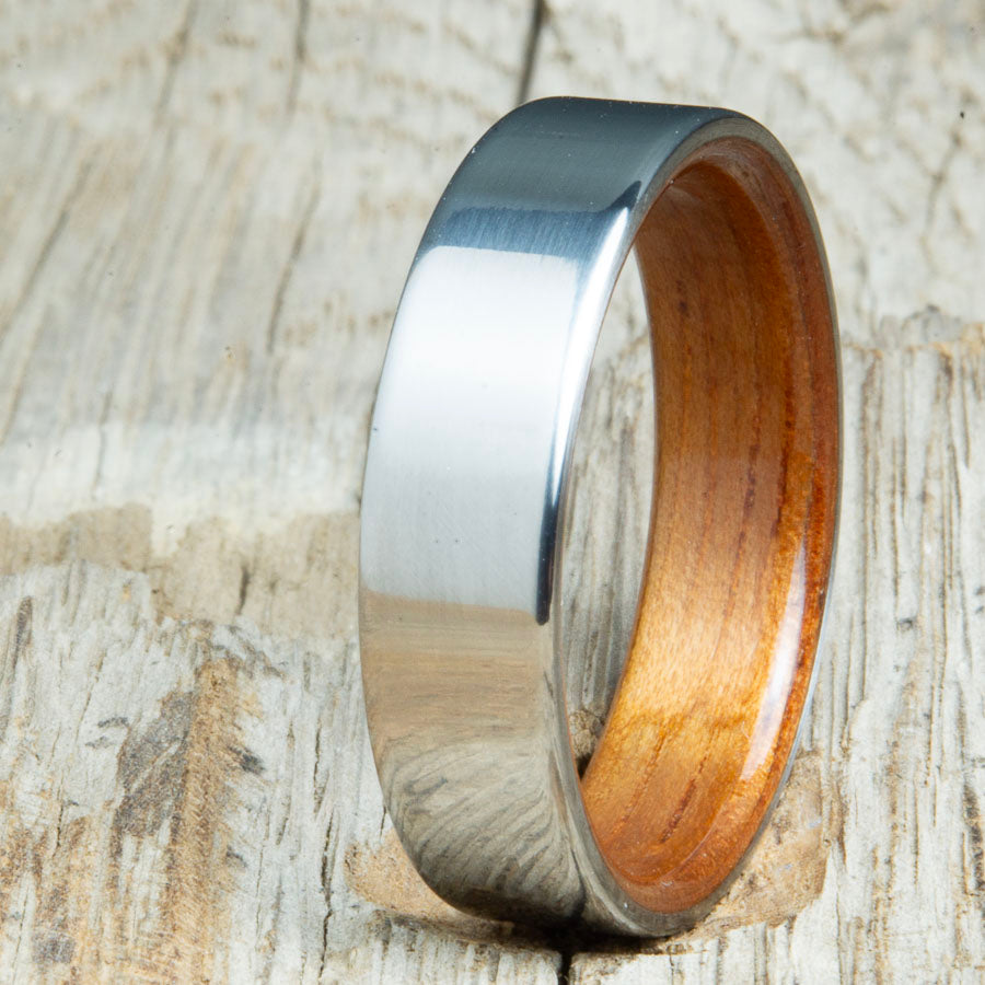 Classic mens wedding bands with Koa wood interior. Unique mens rings made by Peacefield Titanium at competitive prices