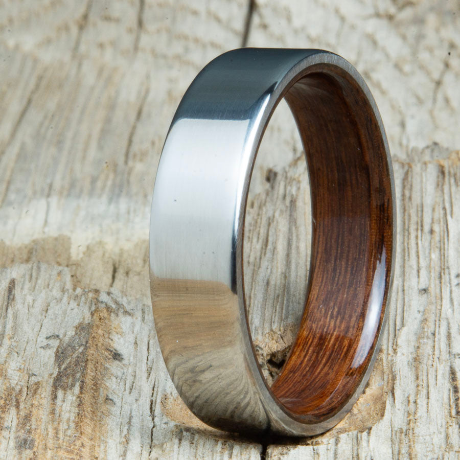 Classic mens Rosewood wood wedding band with polished titanium. Custom wood rings made by Peacefield Titanium