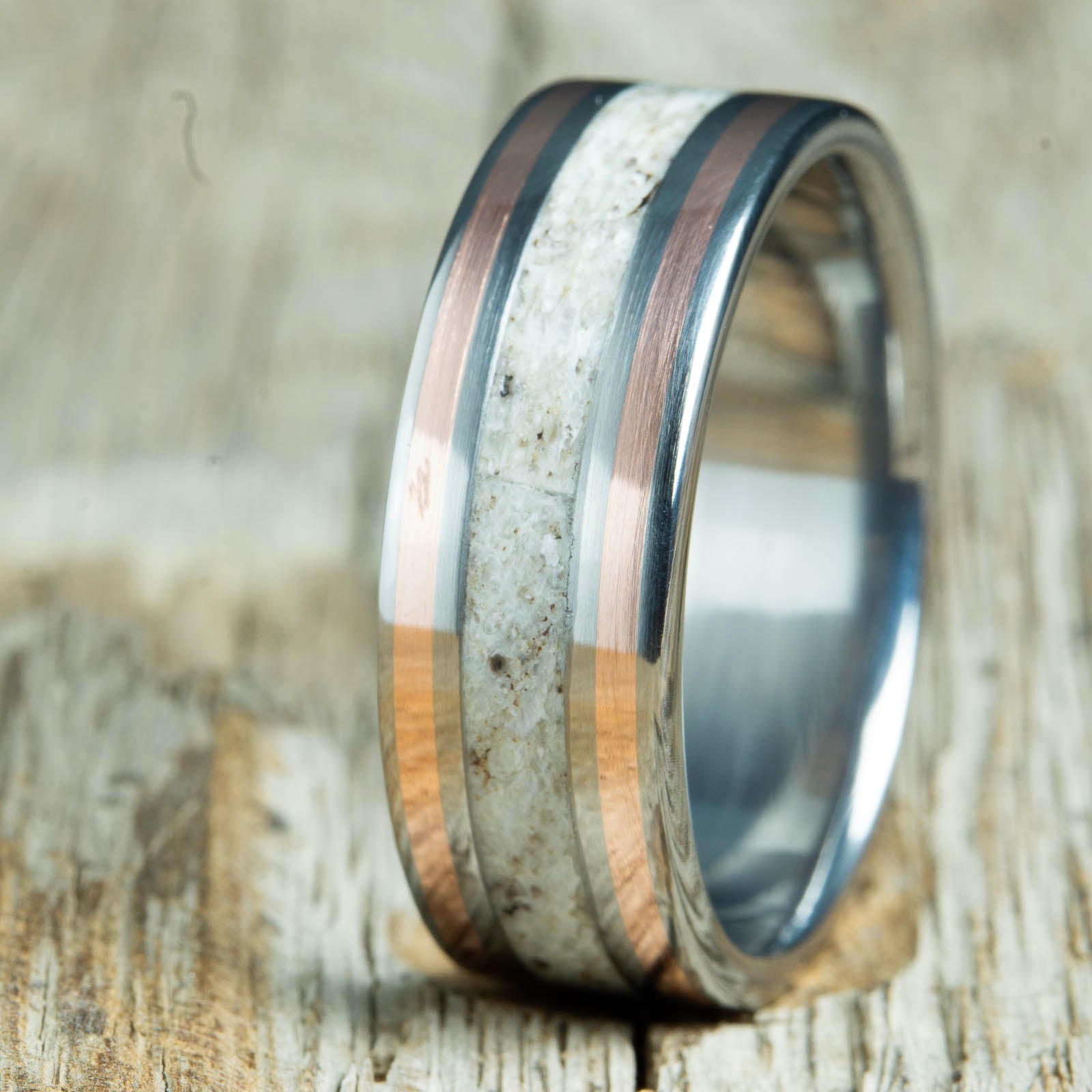 Antler ring with copper pinstripes, custom made titanium ring by Peacefield Titanium