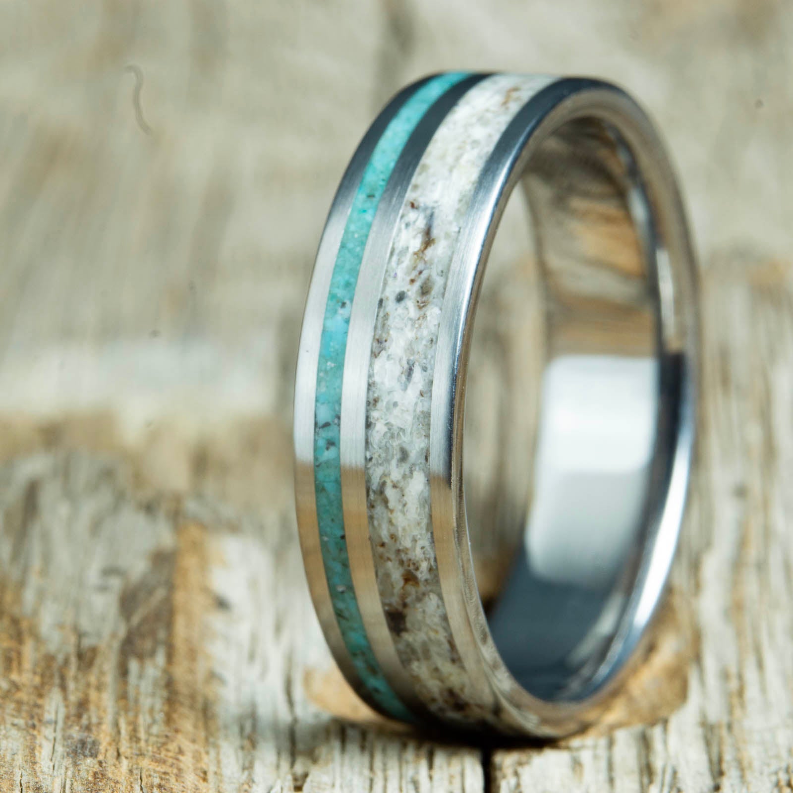 Antler ring with offset turquoise pinstripe inlay on polished titanium band