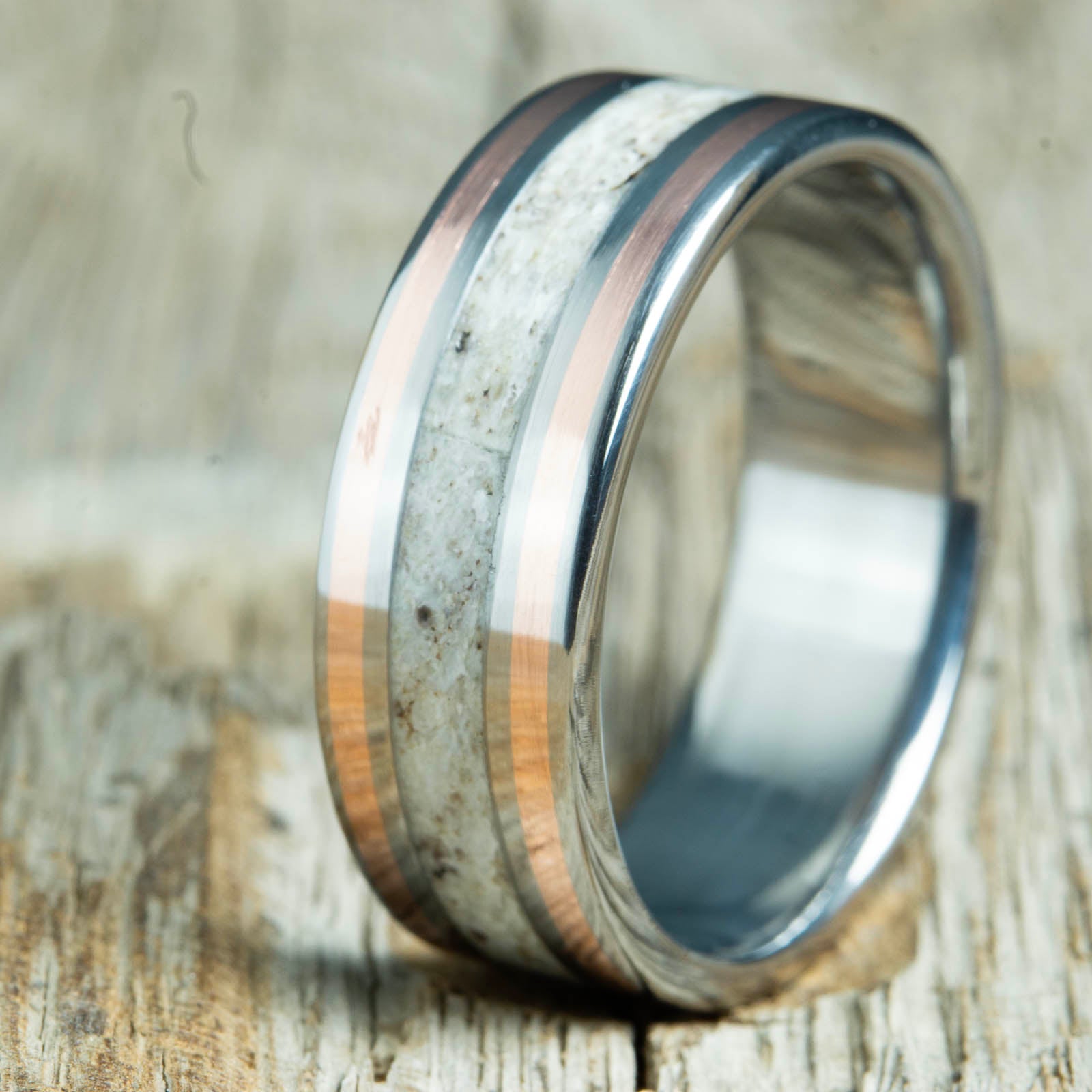 Antler and copper rings by Peacefield Titanium