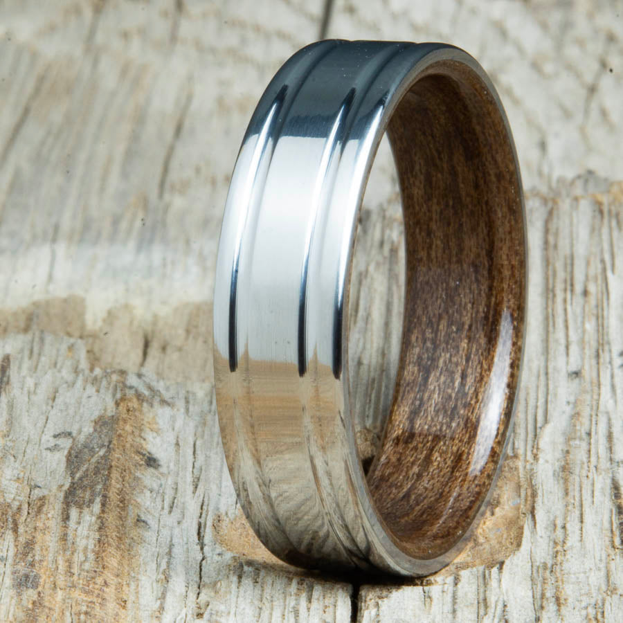 double groove polished titanium Walnut wood ring. Custom unique titanium wood rings made by Peacefield Titanium