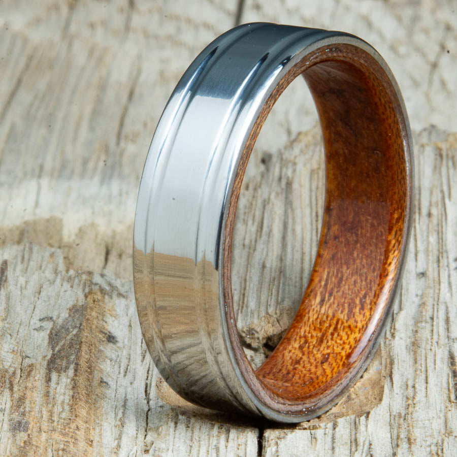 double groove polished titanium Acacia wood ring. Custom unique titanium wood rings made by Peacefield Titanium