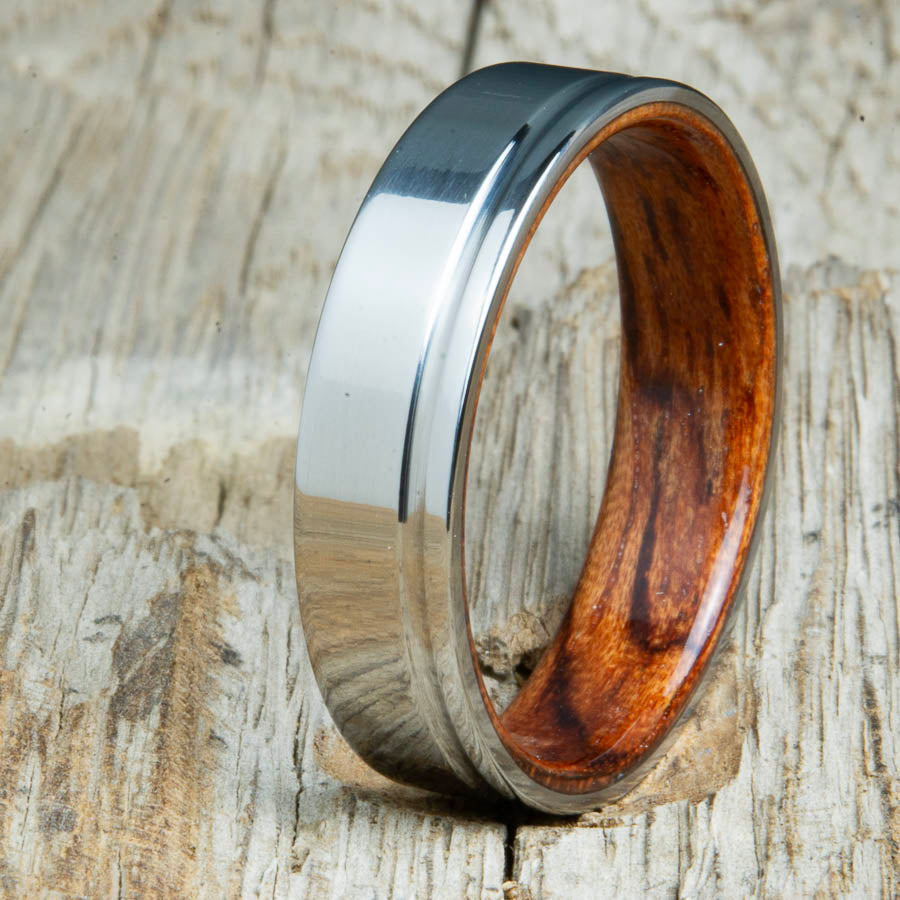 polished groove titanium and wood rings with Bubinga. Unique handcrafted titanium wood rings made by Peacefield Titanium