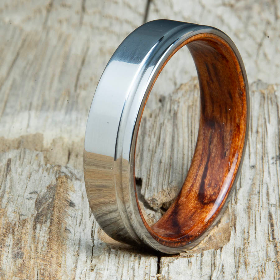 polished groove titanium and wood rings with Bubinga. Unique handcrafted titanium wood rings made by Peacefield Titanium