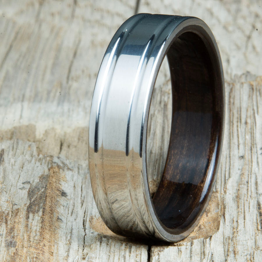 double groove polished titanium Ebony wood ring. Custom unique titanium wood rings made by Peacefield Titanium