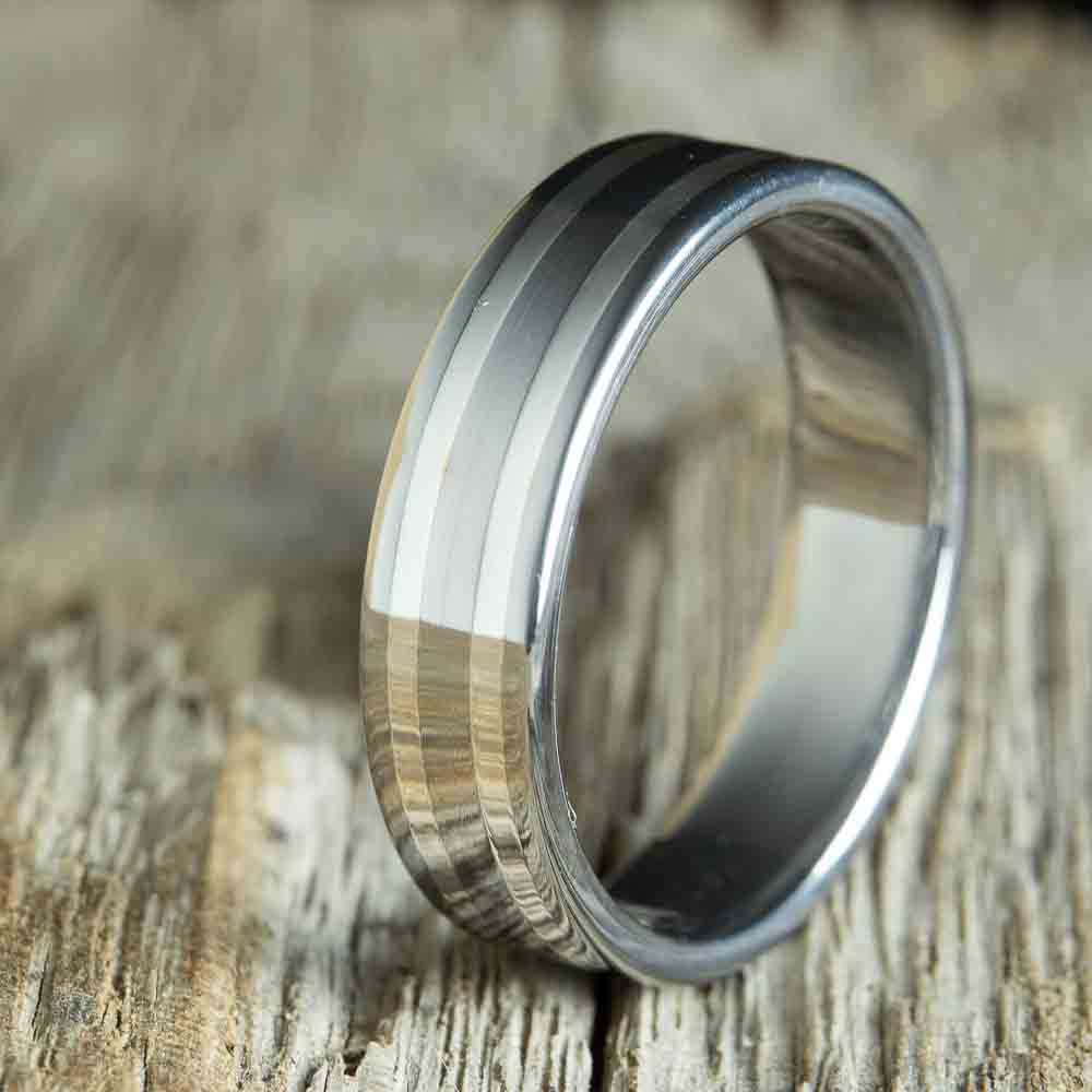 titanium ring with 2 silver pinstripes