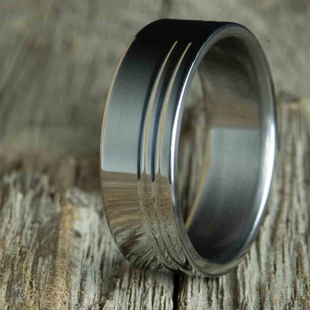 mirror polished titanium wedding ring with custom grooves