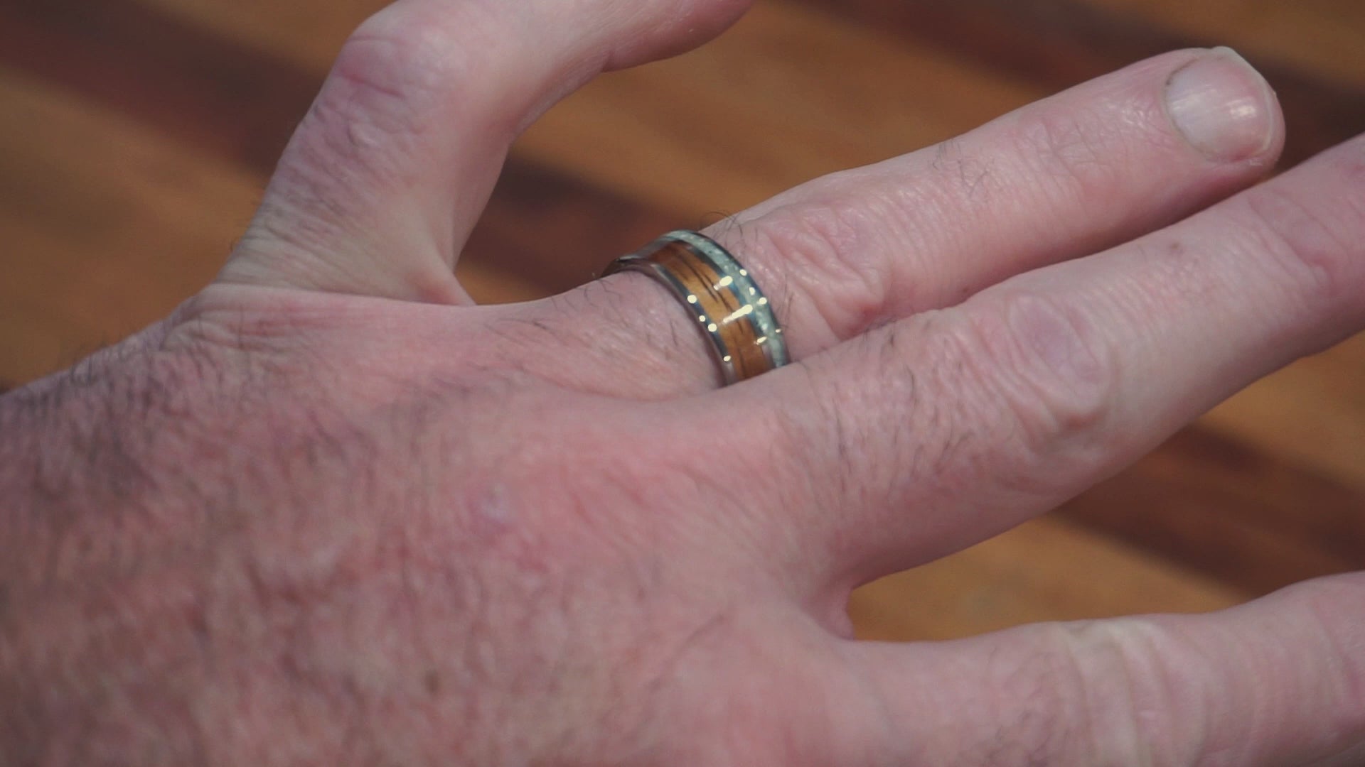 Koa wood ring with crushed pearl inlay