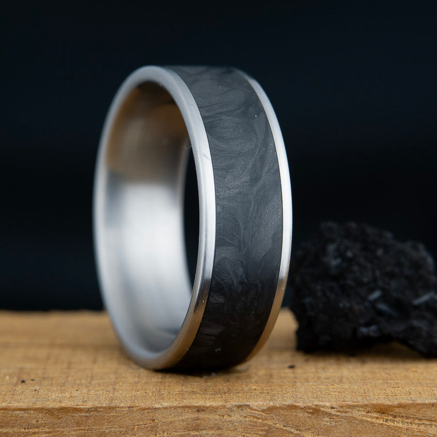 satin titanium ring with forged carbon fiber inlay