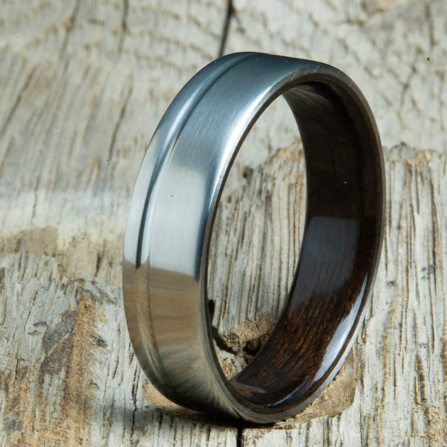 Single grooved pinstripe satin titanium mens ring with Rosewood wood. Unique mens rings with wood and titanium made by Peacefield Titanium.