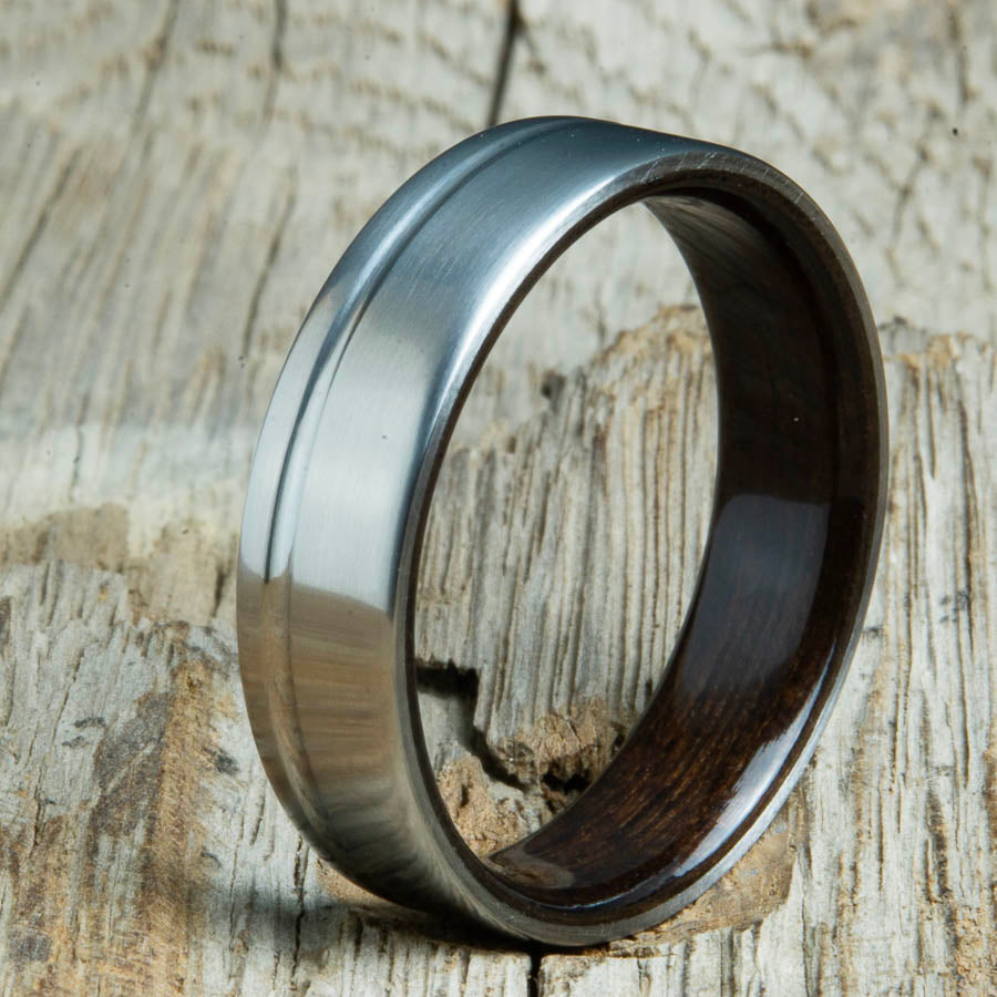 Single grooved pinstripe satin titanium mens ring with Rosewood wood. Unique mens rings with wood and titanium made by Peacefield Titanium.