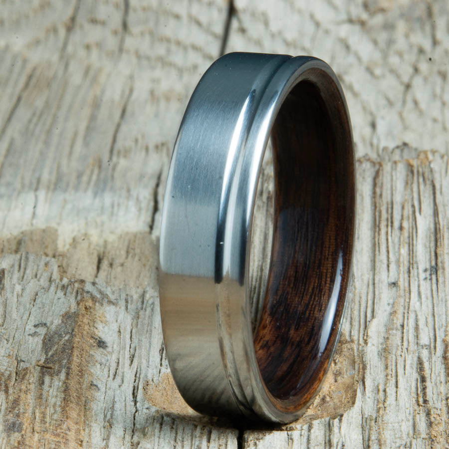 Single grooved pinstripe satin titanium mens ring with Ebony wood. Unique mens rings with wood and titanium made by Peacefield Titanium.