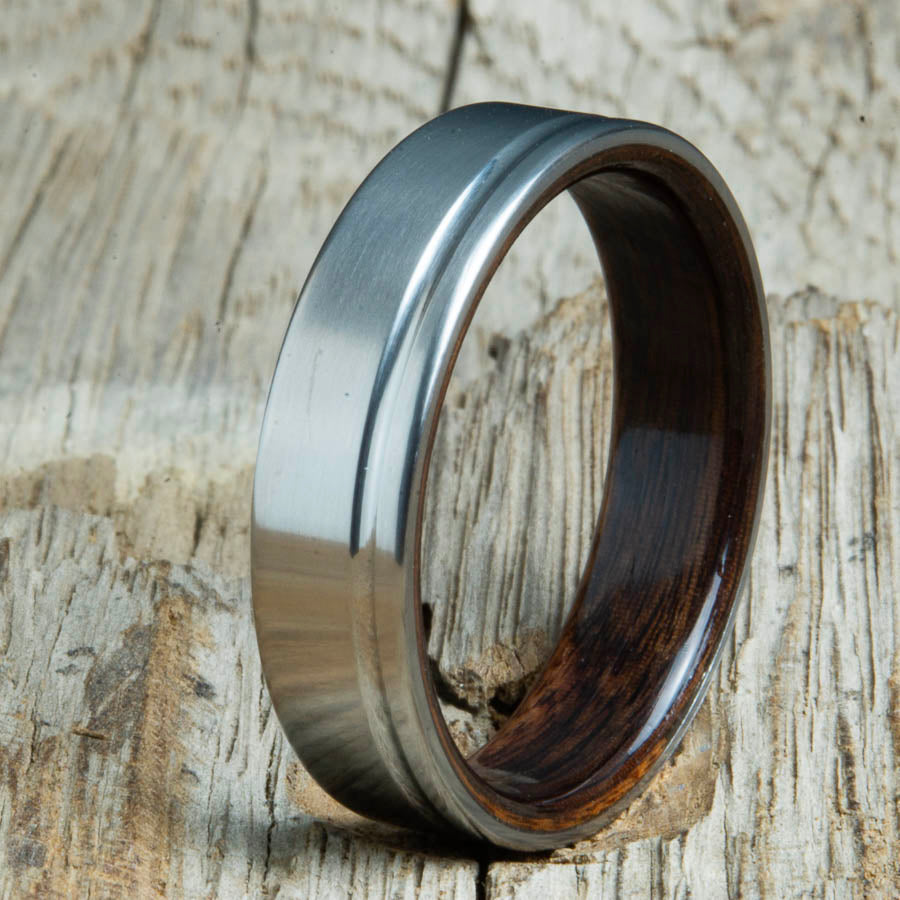 Single grooved pinstripe satin titanium mens ring with Ebony wood. Unique mens rings with wood and titanium made by Peacefield Titanium.