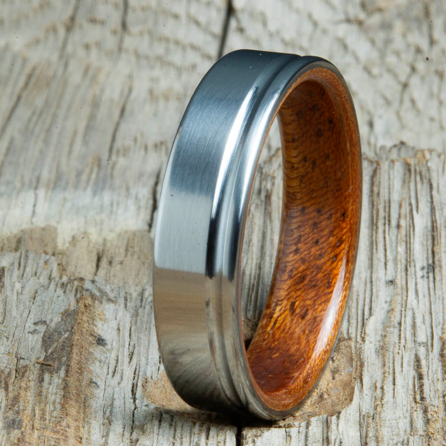 Single grooved pinstripe satin titanium mens ring with Acacia wood. Unique mens rings with wood and titanium made by Peacefield Titanium.