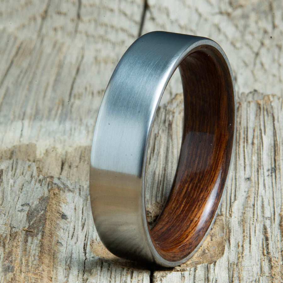 Mens rings with satin titanium and Rosewood interior. Unique Mens rings and wedding bands handcrafted by Peacefield Titanium