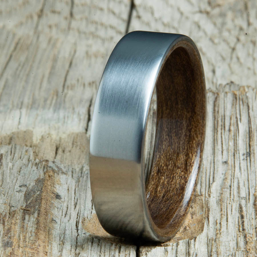 classic satin titanium with Walnut wood interior ring. Custom titanium wood rings made by Peacefield Titanium