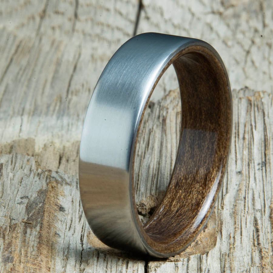 classic satin titanium with Walnut wood interior ring. Custom titanium wood rings made by Peacefield Titanium