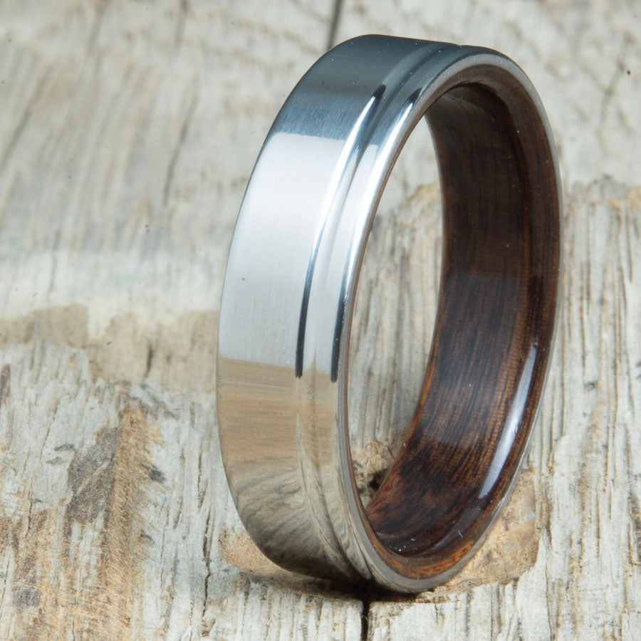 Titanium wedding bands with Rosewood interior. Unique handcrafted rings and bands made by Peacefield Titanium.